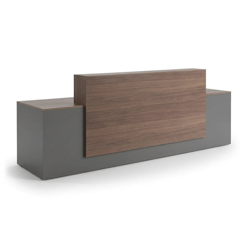 Taviel reception desk in slate gray with walnut riser, studio view