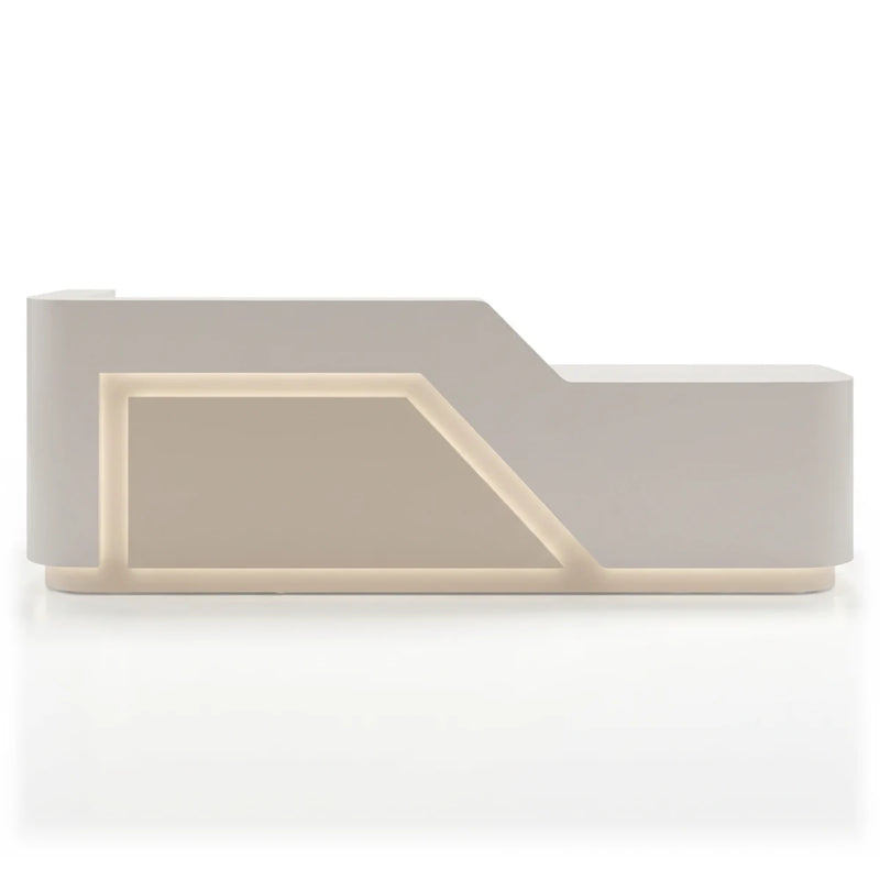 Solenne reception desk in high-gloss white with an LED light channel, studio view