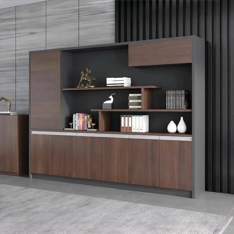 Dervan office shelves angled in a gray-paneled room, books, binders and vases on the staggered dark oak shelves