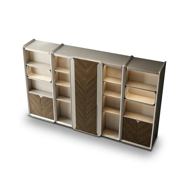 Lorient office wall unit in pearl gray with a walnut chevron sliding door, lit open shelves and lower cabinets, front view