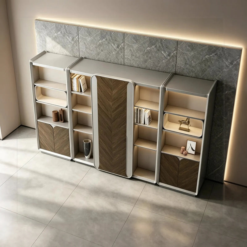 Lorient office shelves angled in a marble-walled room, integrated lighting on the tiers, walnut chevron doors