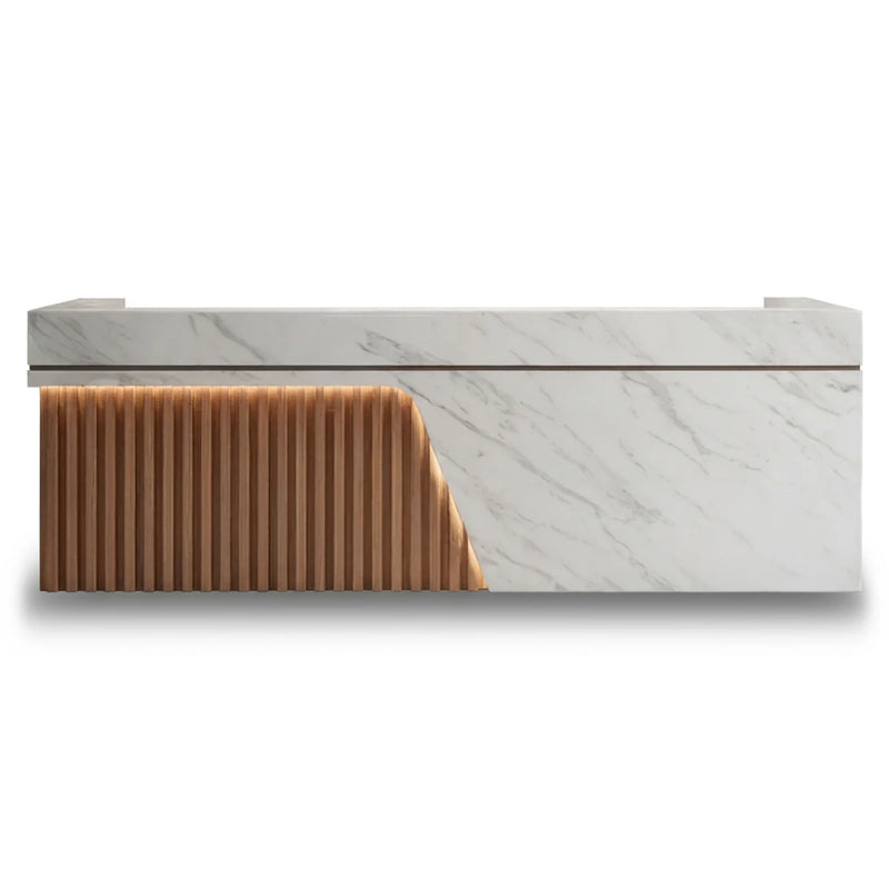 Niven reception desk, veined white body with lit timber-slat wedge, studio view
