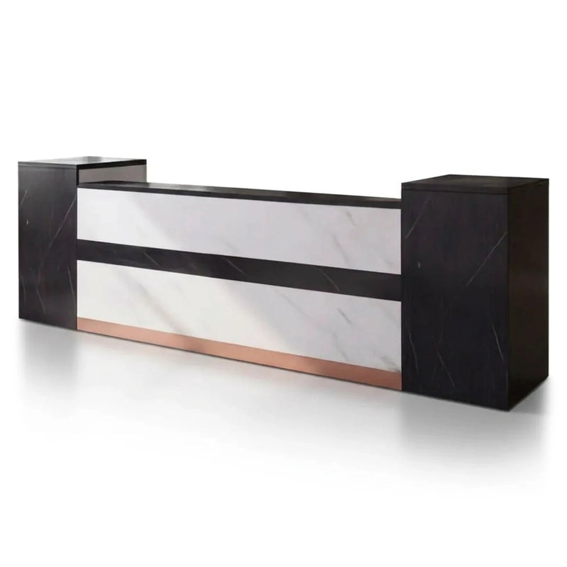 Rhett reception desk in white marble with black towers and copper base