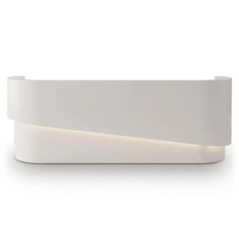Emery luxury reception desk in white with a lit diagonal seam, studio angle