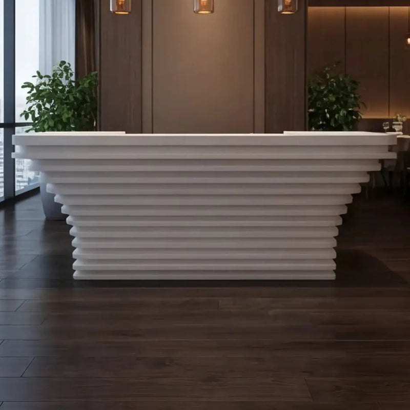Dahlia front desk by floor-to-ceiling windows in a restaurant