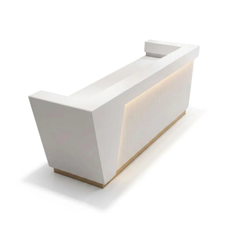 Elliora reception desk in white with backlit fluted front and brass base