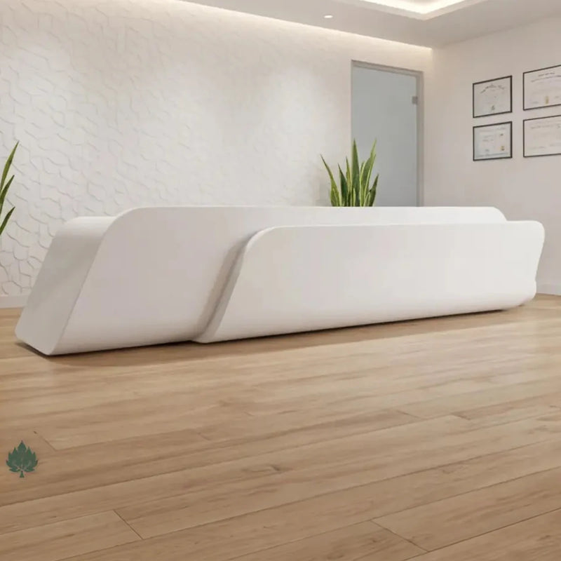 Auden reception desk angled in a bright medical office