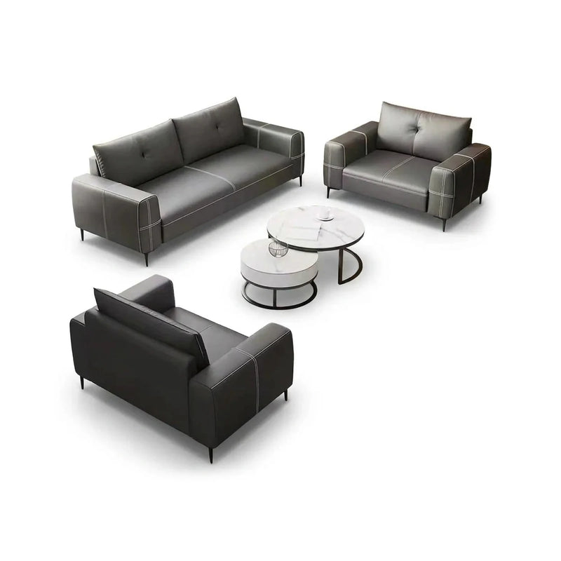 Visby modern office lounge conversation set in gray leather with contrast stitching: 3-seater sofa, two arm chairs and nesting tables