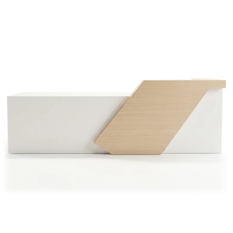 Emvere reception desk in chalk white with a diagonal wood panel, studio view