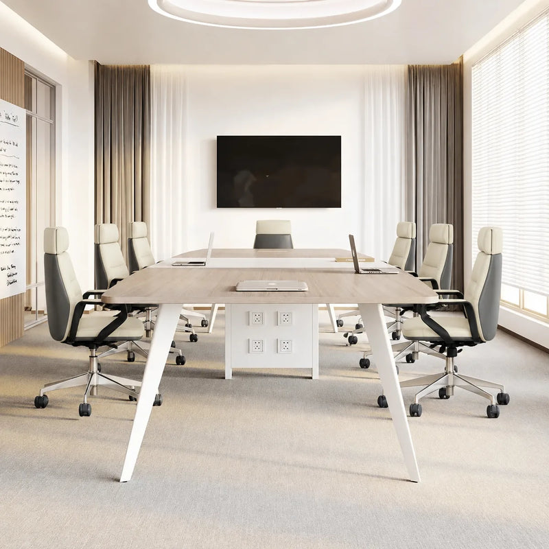 Affney collaborative meeting table with eight ivory mesh chairs in a bright conference room with a wall display