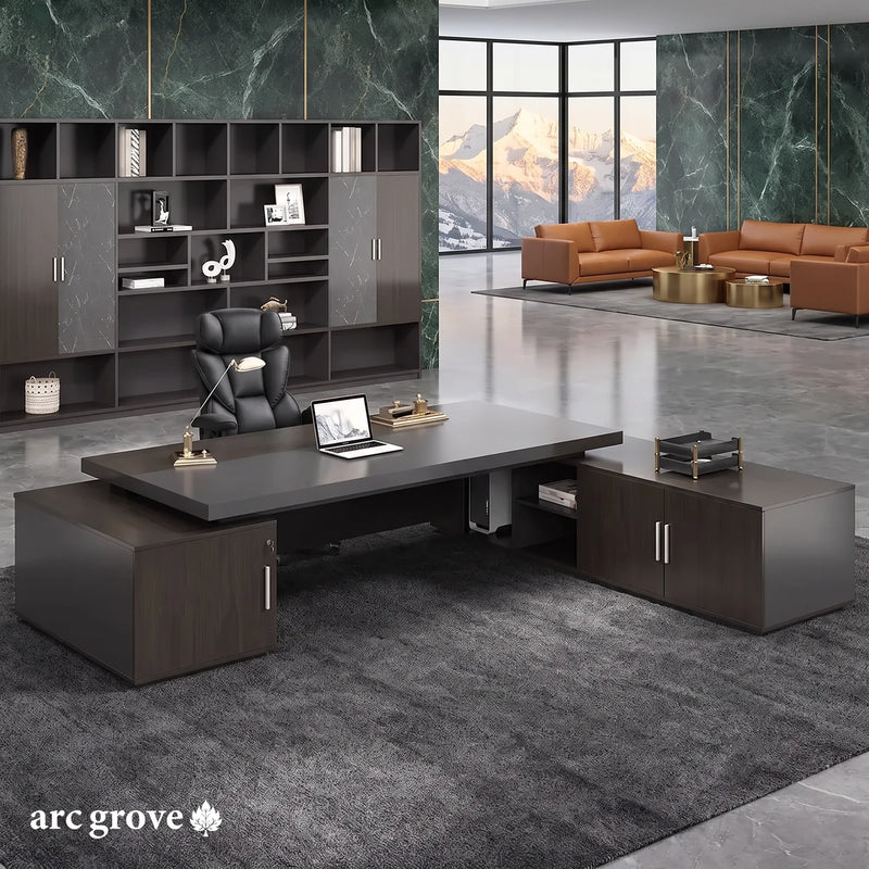 Exeter desk from the executive's side in a green marble office with cognac leather lounge chairs