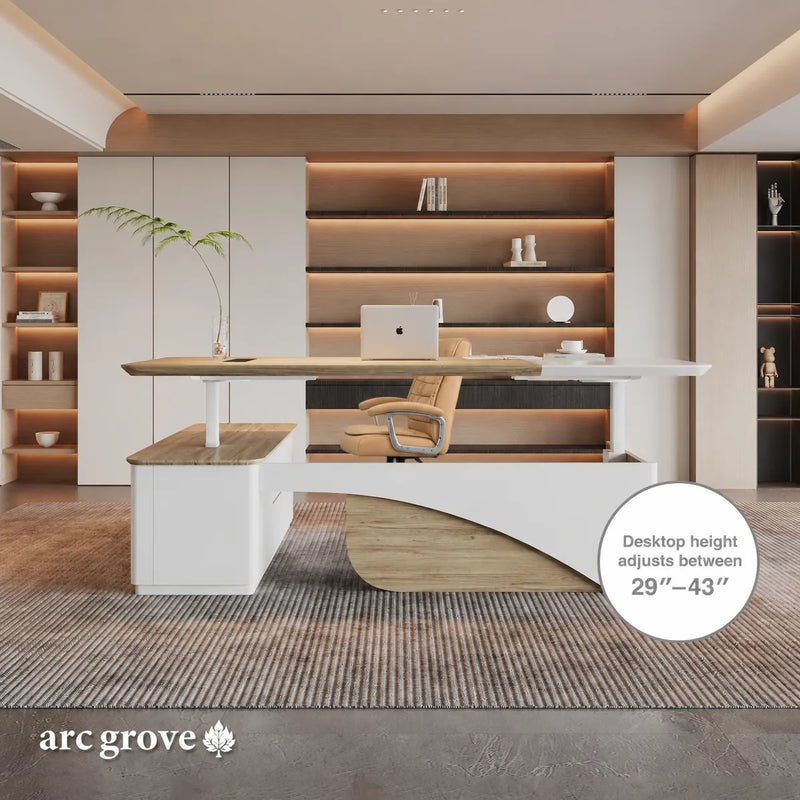 Albion desktop raises and lowers between 29″ and 43″, shown in a designer office