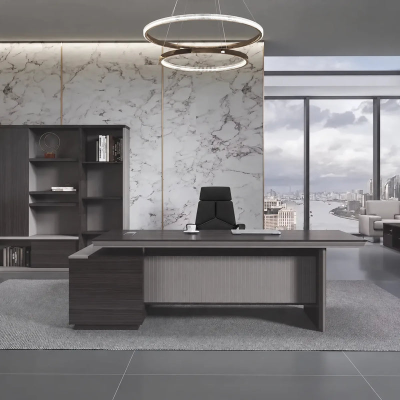 Allard desk with right return in a marble-walled lawyer's office overlooking the city