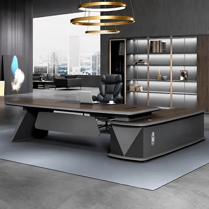 Alwin desk in walnut, left return, beside a silver display bookcase