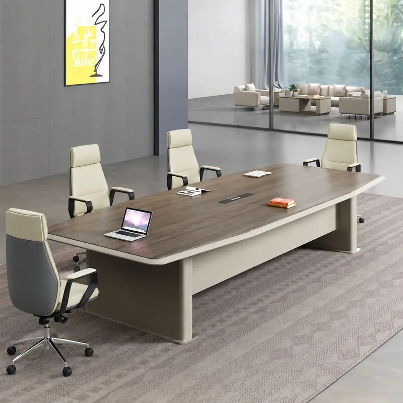 Alwyn 8′ (96-inch) six-seat meeting table in walnut with an open laptop and three leather chairs