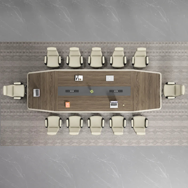 Overhead view of the Alwyn walnut boardroom table seating 12, with charging outlets along the center