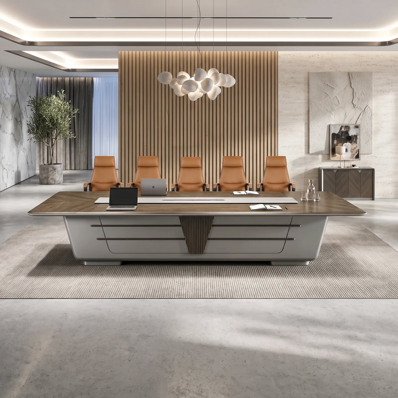 Amiens conference table seen straight on, five tan chairs, gray sculpted base with a wood accent