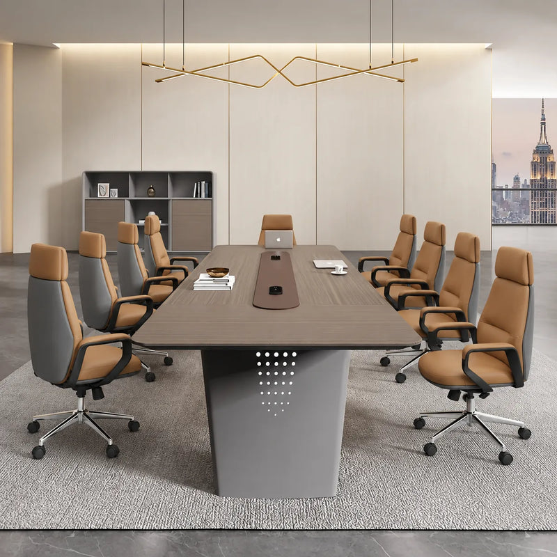 Amity large conference table with eight tan-and-gray chairs beneath a brass pendant light