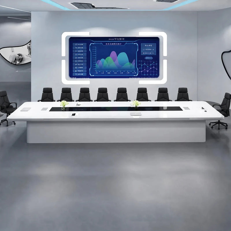 Amix white boardroom table with orange chairs facing a wall-mounted dashboard screen in a futuristic office