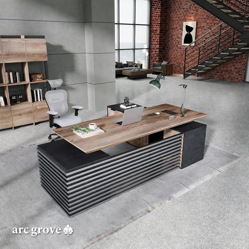 Anderson desk in a two-story loft office, desktop at sitting height with executive chair