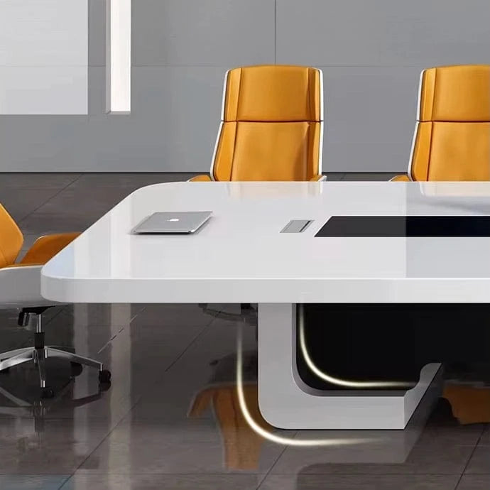 Detail of the Nexum curved white base with an LED glow beneath the tabletop