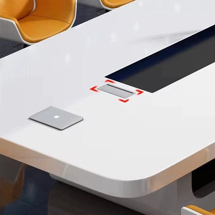 Close-up of the Nexum white top with a highlighted cable management grommet beside the black channel