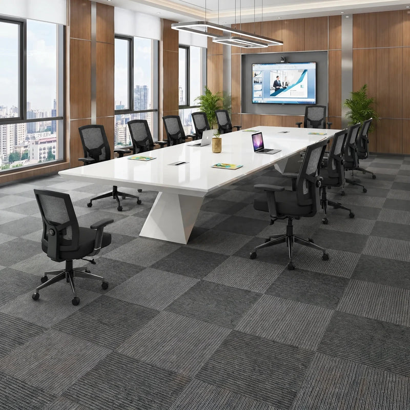 Ardyn white boardroom table with black mesh chairs in a wood-paneled room with city windows