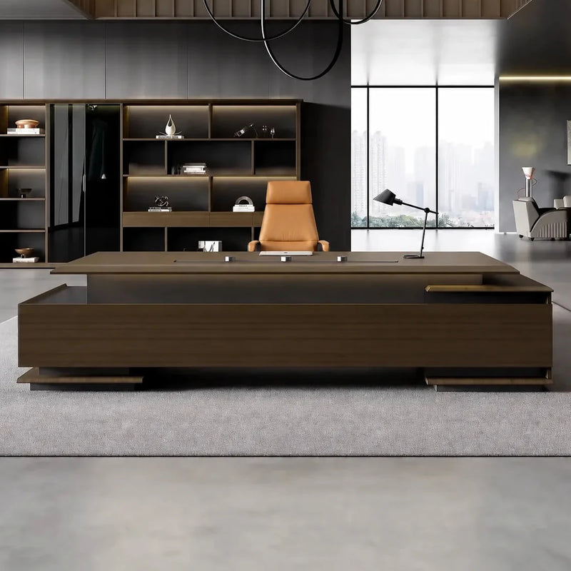 Aspen executive desk with brass underline in a dark-paneled CEO office