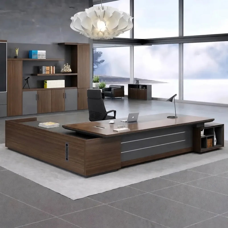 Dark Oak Atlas L-shaped desk with right return in an executive office with built-in shelving