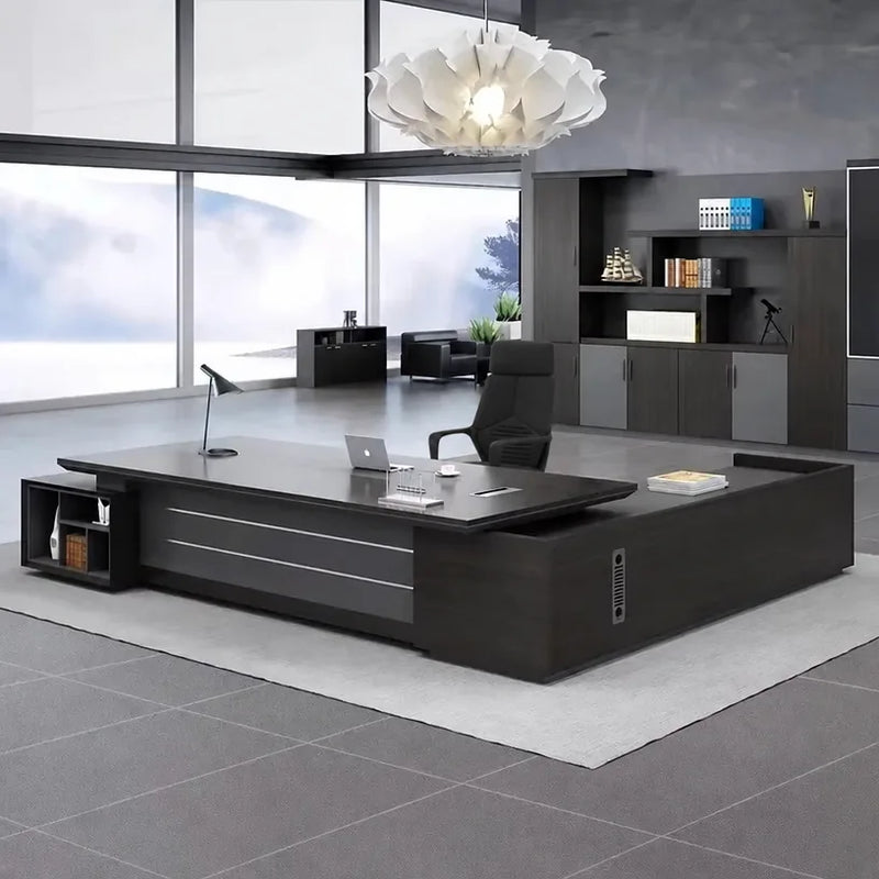 Atlas big executive desk in Midnight Black, left return, in a corner office with lake views