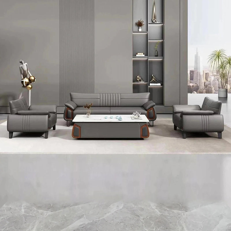 Vaxholm gray lounge set with a stone-top coffee table in a gray room with a city skyline window
