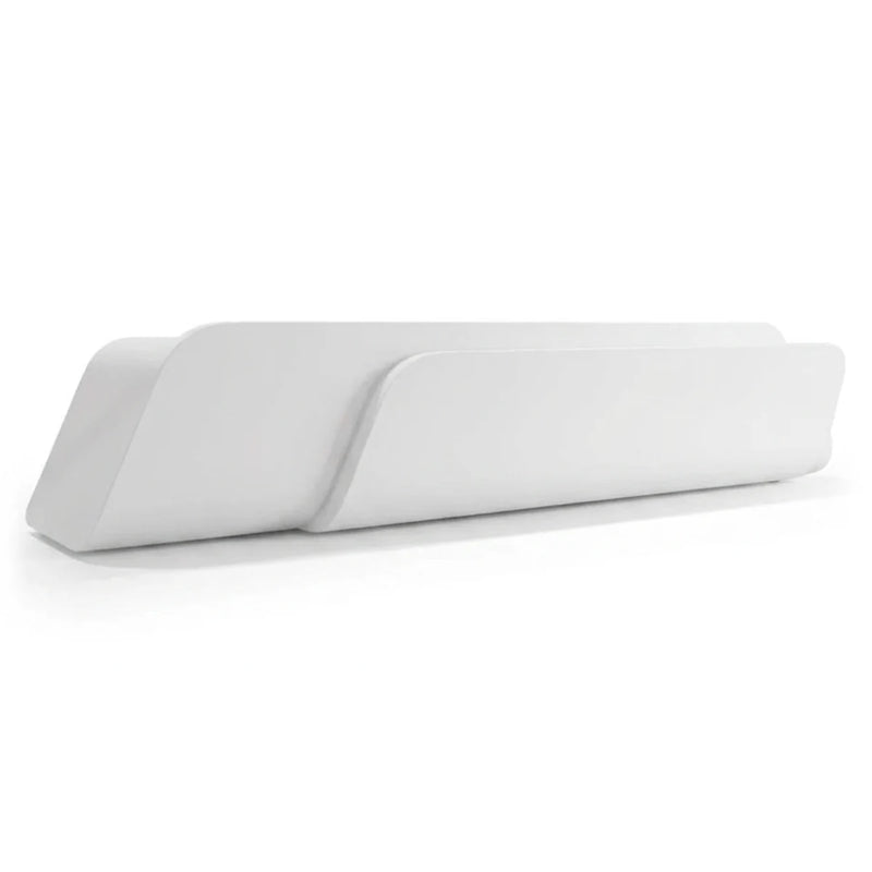 Auden reception desk in white, low wedge profile, studio view