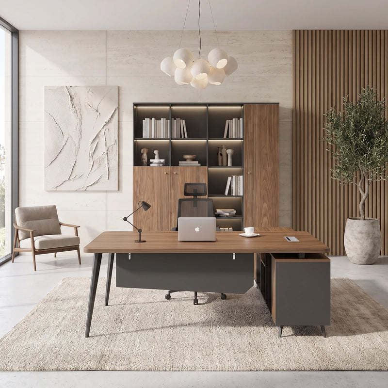 Caelum executive desk in a stone and oak office beside its matching shelving
