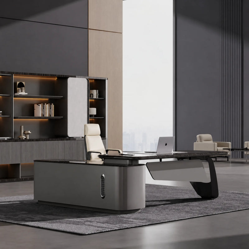 Caldrin desk, right return, in a gray gallery office with cream chair
