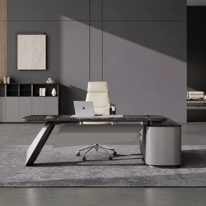 Caldrin desk with curved blade base in a spare concrete office
