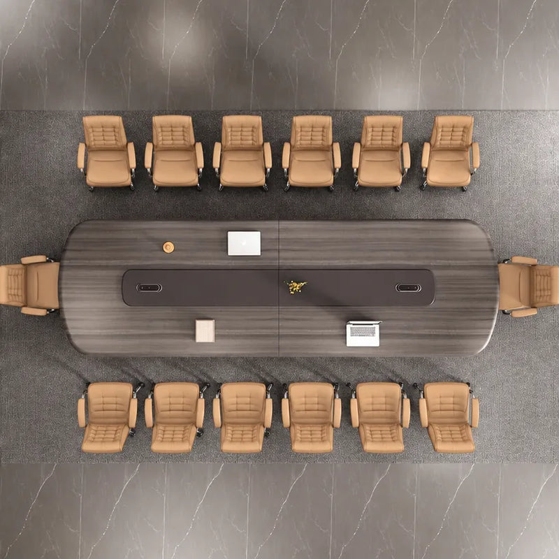Top-down view of the Caliber conference table seating 14 with two powered center panels