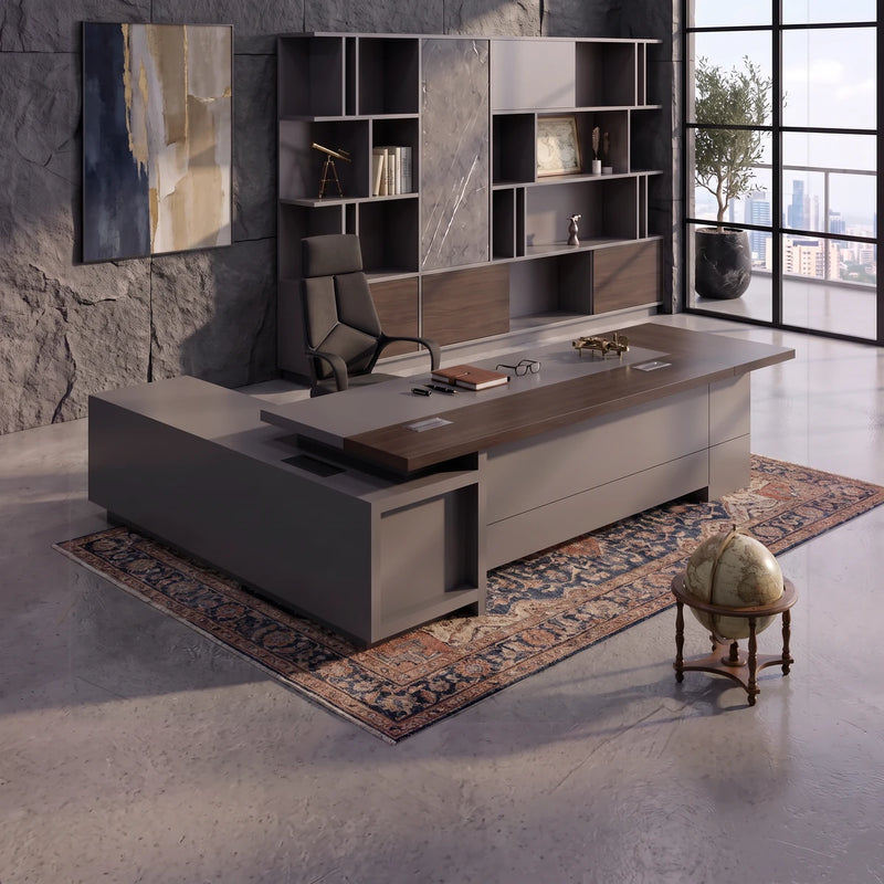 Carwin desk in dark walnut, right return, against a marble shelf wall