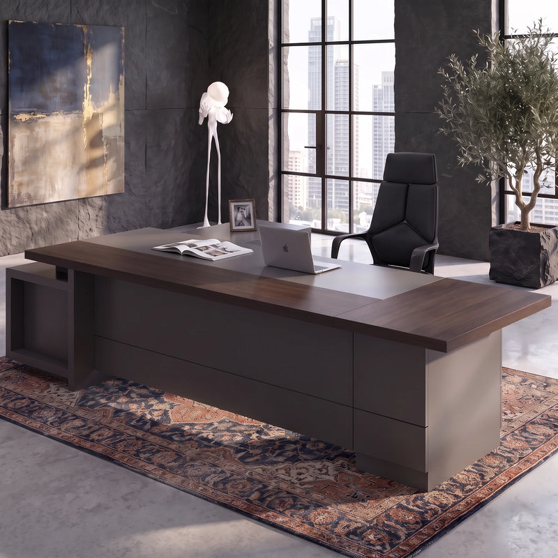 Carwin desk with laptop under a sculpted white pendant
