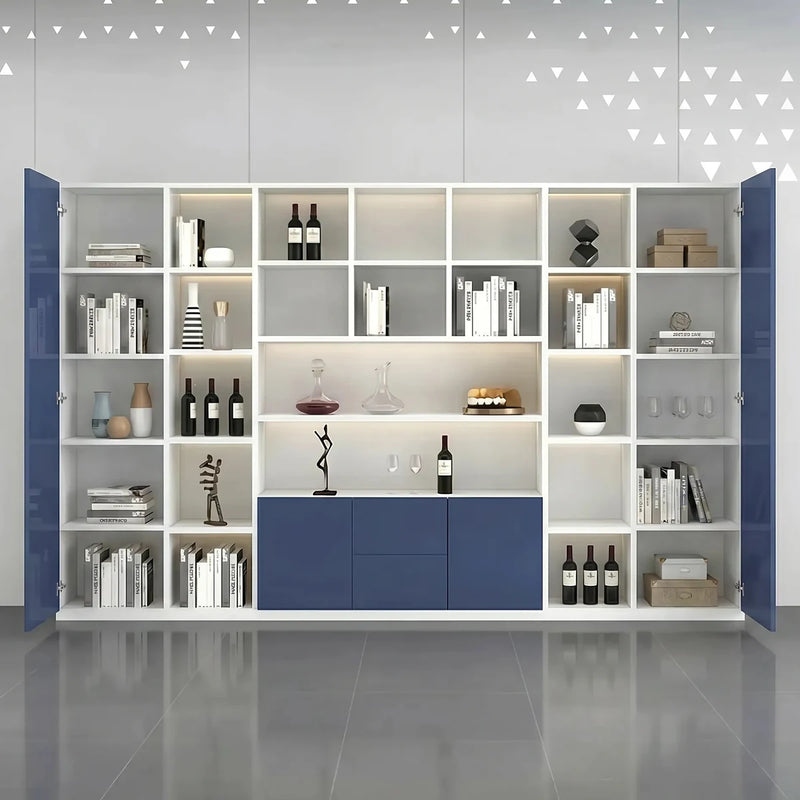 Axiom white office shelves lit by integrated LED lighting, blue cabinet doors, books and glassware on the open grid