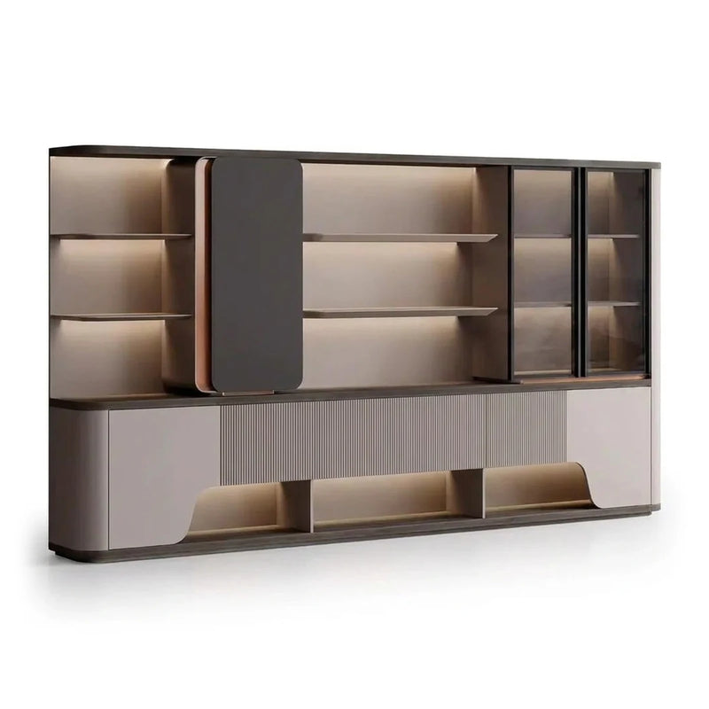 Merit office wall unit in gray woodgrain, lit open shelves, smoked glass cabinet and a curved ribbed base, front view