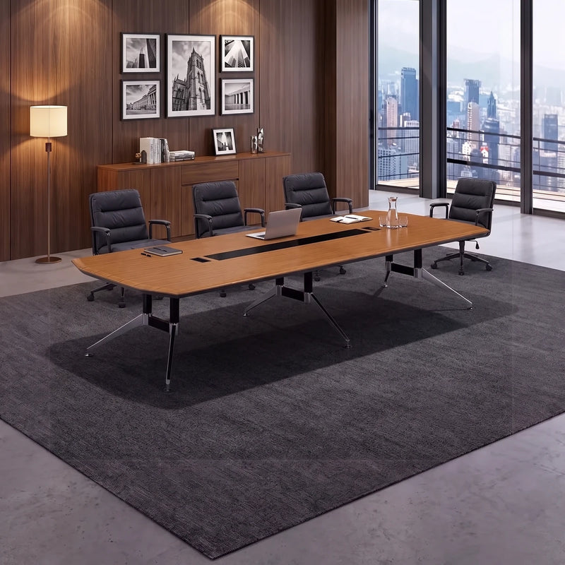 Convo conference table in a walnut-panelled boardroom with framed black-and-white photos