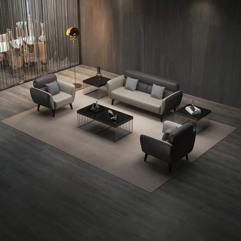 Möja gray and beige leather conversation set with a black coffee table in a lounge with a woven screen