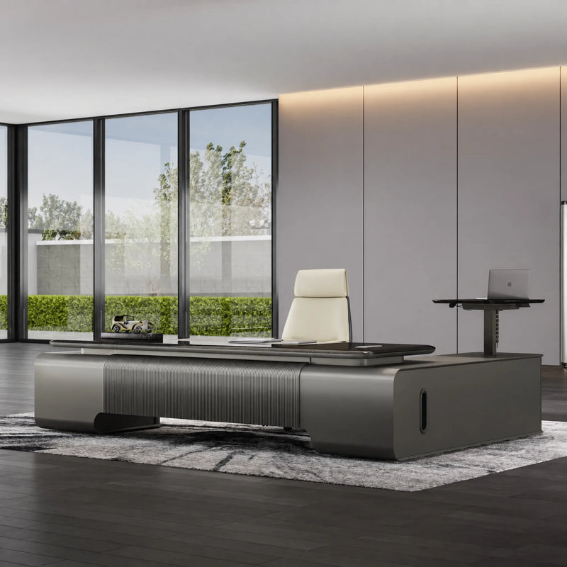 Elevon desk facing floor-to-ceiling windows with garden view