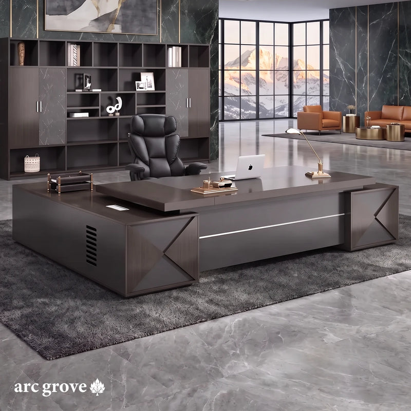 Exeter executive desk in gray oak in a green marble office with brass trim and mountain views