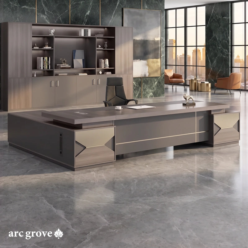 Eyer gray L-shaped executive desk with champagne diamond-cut pedestal panels in a green marble office with city windows