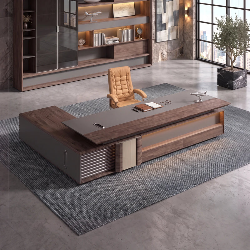 Frisco desk in walnut in a warm office with display wall and sofas