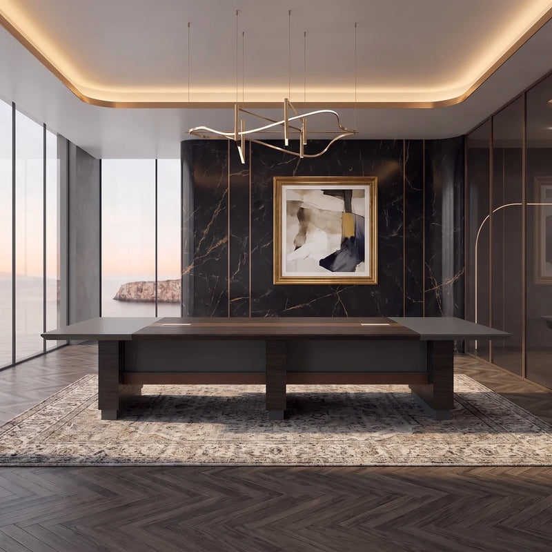 Fuller conference table on its own in the dark marble boardroom