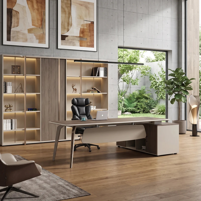 Grafton executive desk in a concrete courtyard office with a garden window beside its matching shelving