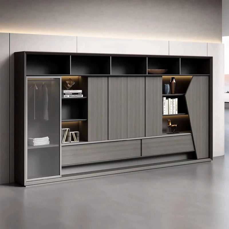 Ravenshaw 12′6″ (150-inch) office storage wall front view in a room, glass closet door, cubby shelves and lower drawers