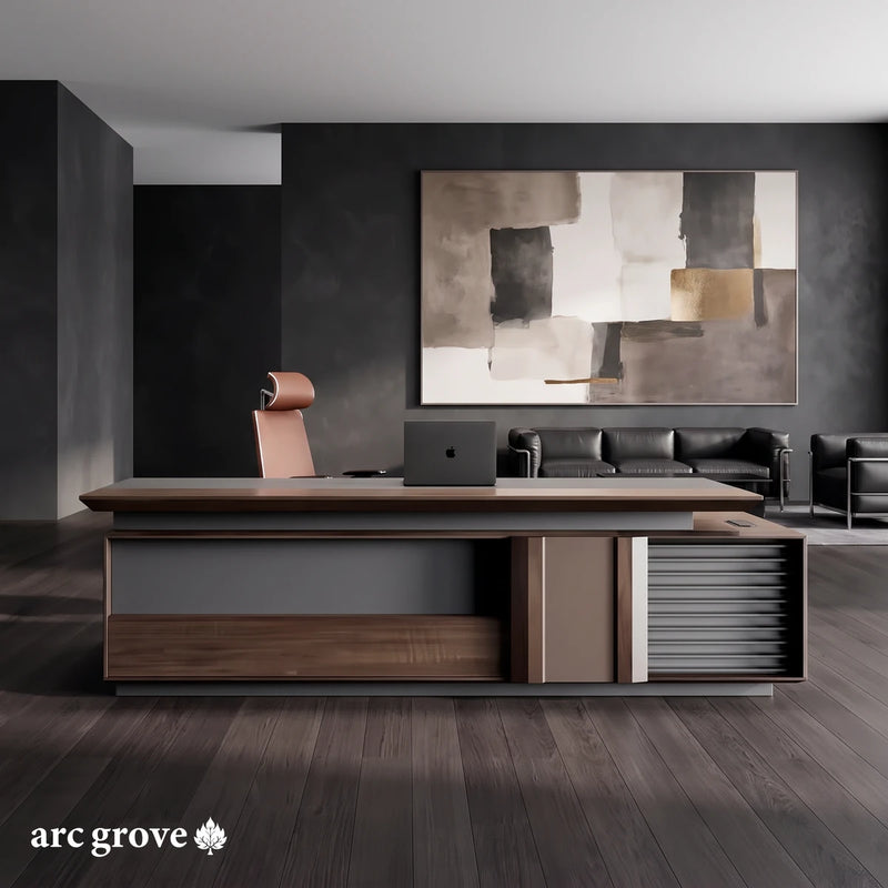 Frisco executive desk seen straight on in a charcoal office with a large painting